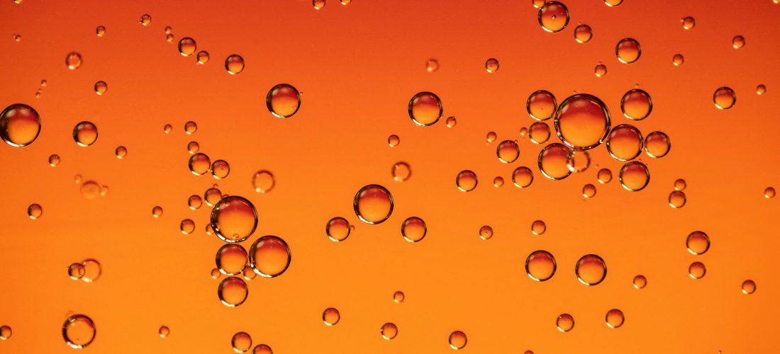 bubbles in an orange solutions showing the mineralization process